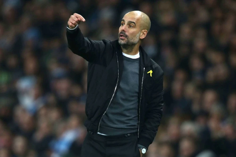 Хосеп Гвардиола и Родри на тренировке или во время матча «Манчестер Сити»