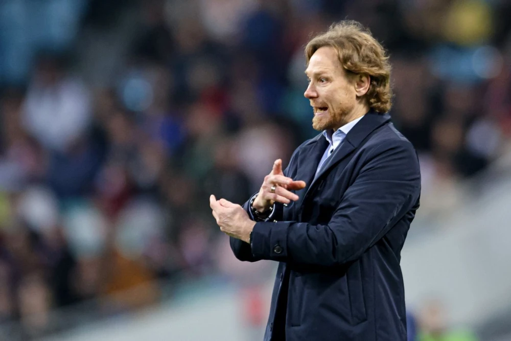 Игроки сборных России, Испании, Англии, Мали, Египта и Японии на футбольном поле перед товарищескими матчами 31 марта 2026 года